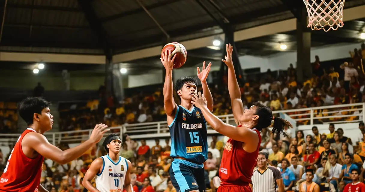 Foreign basketball player going for a layup in a PBA arena while being defended by local players
