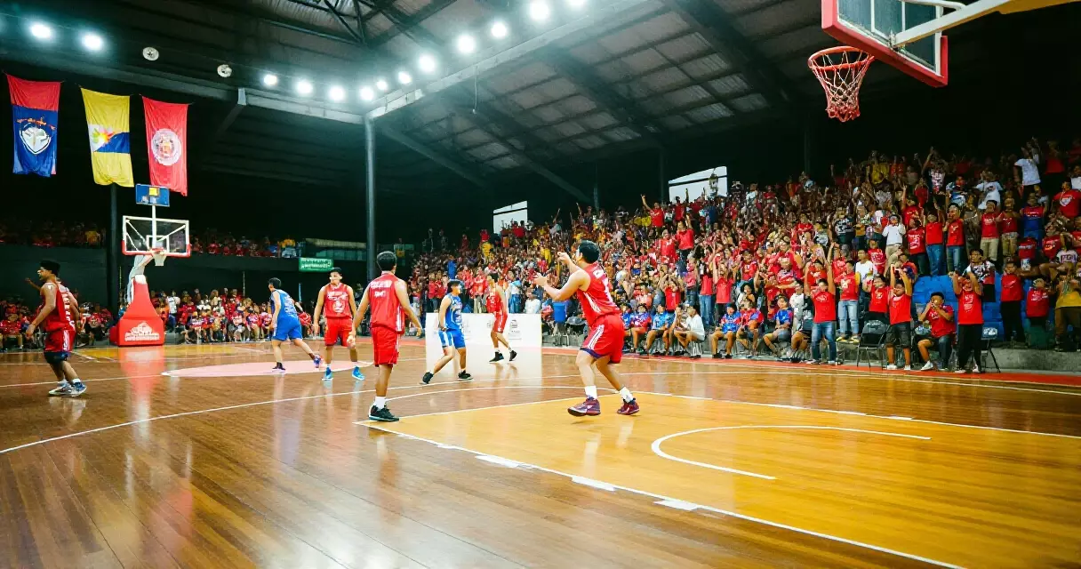 Basketball fans in an arena in the Philippines watching a PBA game