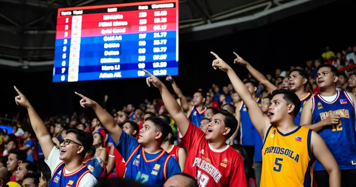 Basketball fans in the arena looking at the team standings on the scoreboard