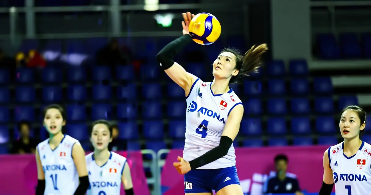 Manlalaro ng volleyball sa aksyon habang nag-eespike sa isang internasyonal na laban